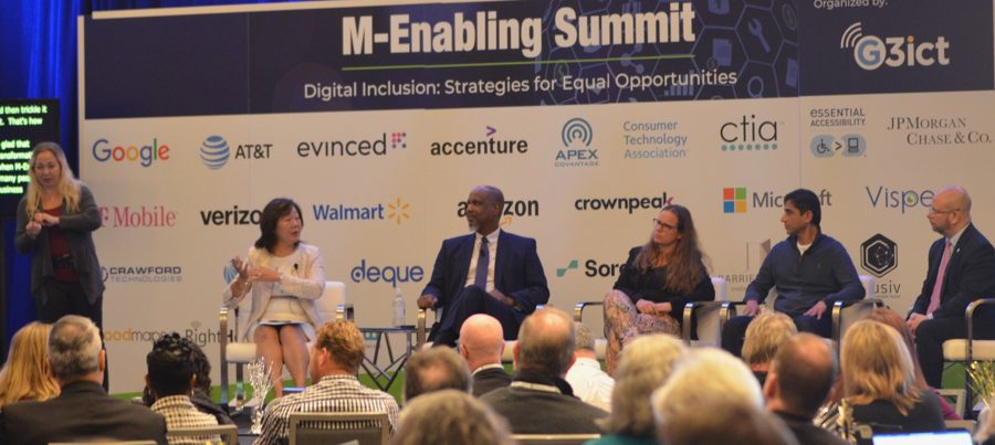 Frances West moderating a panel at the M-Enabling Summit